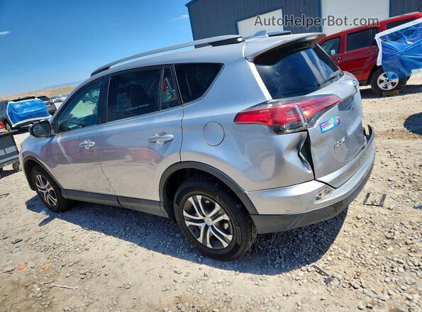 2T3BFREV3HW619912 2017 TOYOTA RAV4 Silver Trasero izquierdo