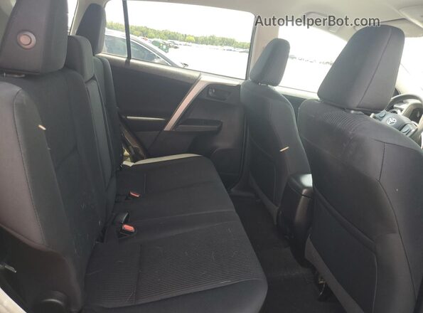 2T3BFREV7GW493617 2016 TOYOTA RAV4 Black Вид задньої частини салону