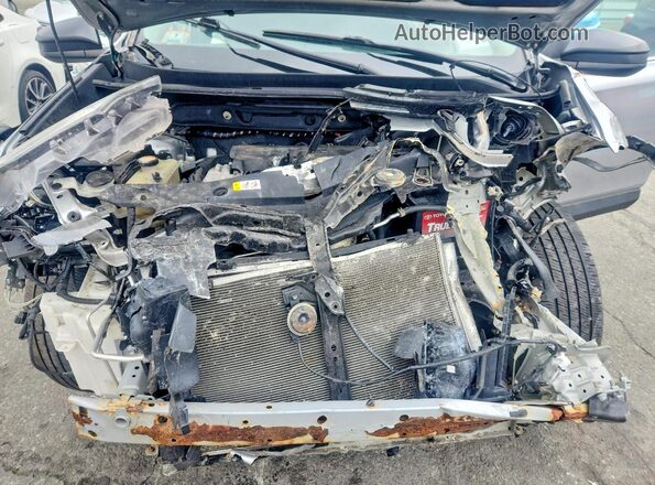 2T3BFREVXJW850280 2018 TOYOTA RAV4 Серебряный Вид задней части салона