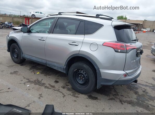 2T3BFREVXJW856497 2018 TOYOTA LE Silver Rear left