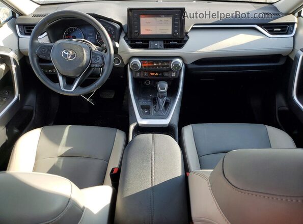 2T3C1RFV2KW054304 2019 TOYOTA LE White Dashboard view