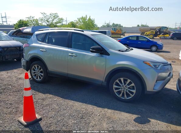 2T3DFREV0GW507334 2016 TOYOTA RAV4 Серебряный Вид задней части салона