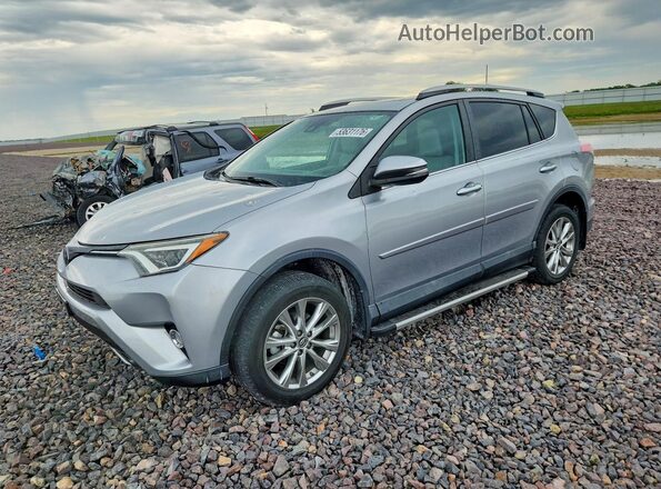 2T3DFREV5JW702899 2018 TOYOTA RAV4 Серебряный Передняя левая четверть
