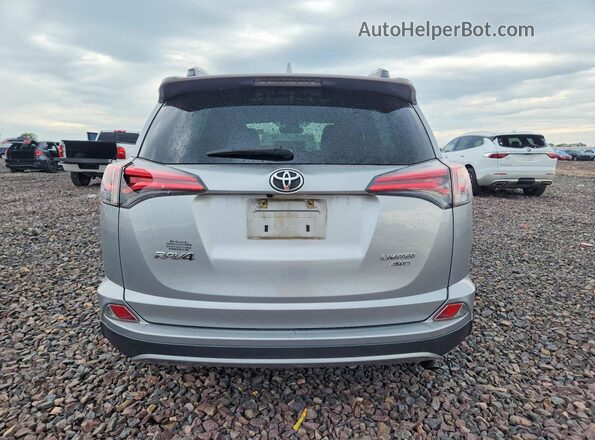 2T3DFREV5JW702899 2018 TOYOTA RAV4 Серебряный Вид сзади