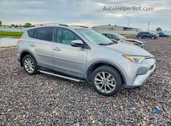 2T3DFREV5JW702899 2018 TOYOTA RAV4 Серебряный Передняя правая четверть
