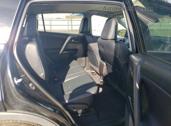2T3DFREVXGW498786 2016 TOYOTA RAV4 Черный Вид задней части салона