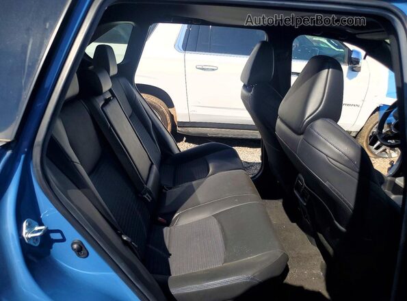 2T3E6RFV8PW046113 2023 TOYOTA RAV4 Blue Widok wnętrza z tyłu