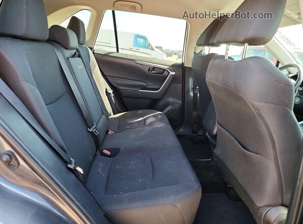 2T3H1RFV1KW055434 2019 TOYOTA RAV4 Charcoal Vista interior trasera