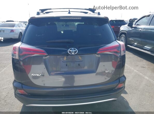2T3NFREV0GW264306 2016 TOYOTA RAV4 Gray 
