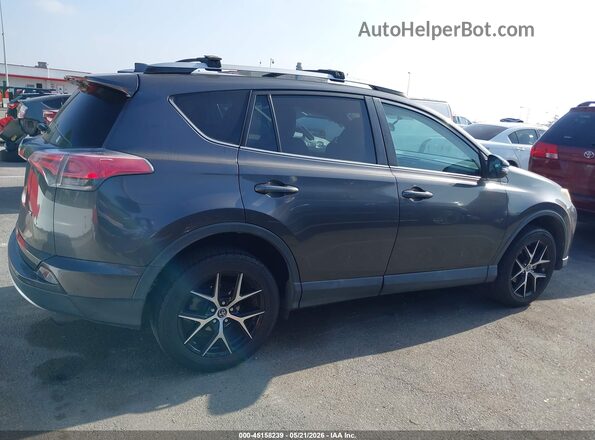 2T3NFREV0GW264306 2016 TOYOTA RAV4 Gray Widok wnętrza z tyłu