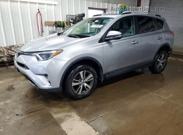 2T3RFREV0GW454964 2016 TOYOTA LE Серебряный Передняя левая четверть