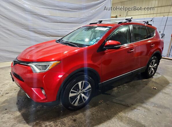2T3RFREV2GW530636 2016 TOYOTA RAV4 Red Առջևի ձախ երեք քառորդ տեսարան