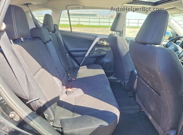 2T3RFREV4GW502188 2016 TOYOTA RAV4 Black Вид задньої частини салону
