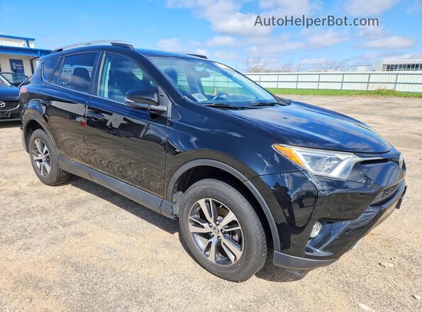 2T3RFREV4GW502188 2016 TOYOTA RAV4 Black Передня права чверть
