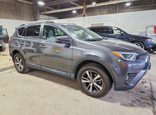 2T3RFREV4JW747189 2018 TOYOTA LE Серый Передняя правая четверть
