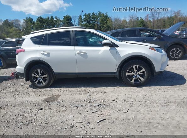 2T3RFREV5GW463594 2016 TOYOTA LE White Вид задньої частини салону