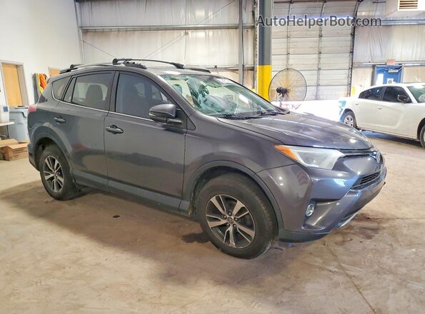 2T3RFREV5HW683786 2017 TOYOTA RAV4 Серый Передняя правая четверть