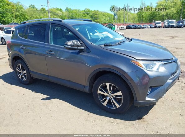 2T3RFREV5JW810168 2018 TOYOTA LE Gray Vista frontal