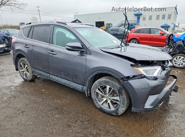 2T3RFREV7JW700321 2018 TOYOTA RAV4 Серый Передняя правая четверть
