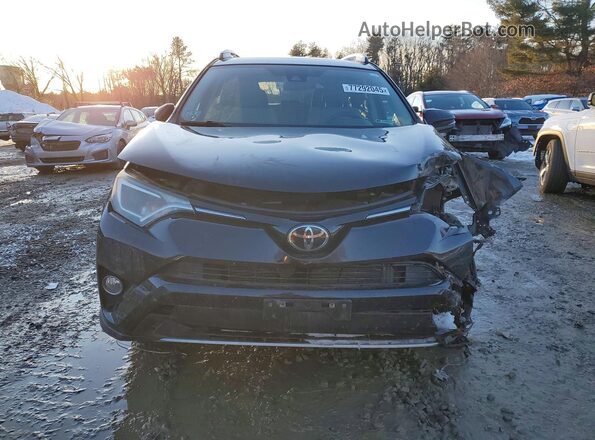 2T3RFREV7JW706684 2018 TOYOTA RAV4 Черный Вид спереди