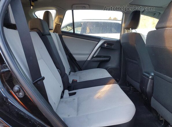 2T3RFREV7JW706684 2018 TOYOTA RAV4 Черный Вид задней части салона