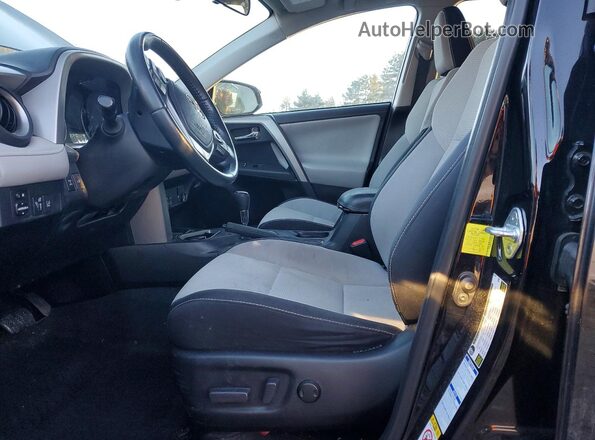 2T3RFREV7JW706684 2018 TOYOTA RAV4 Черный Вид салона спереди