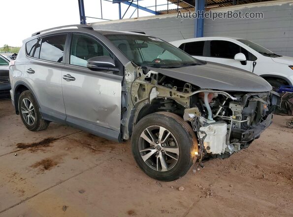 2T3RFREV8GW476467 2016 TOYOTA RAV4 Серебряный Передняя правая четверть