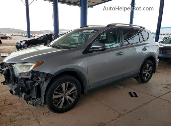 2T3RFREV8GW476467 2016 TOYOTA RAV4 Серебряный Передняя левая четверть