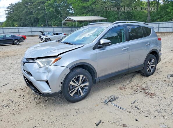 2T3RFREV8GW509323 2016 TOYOTA RAV4 Silver Przód lewy
