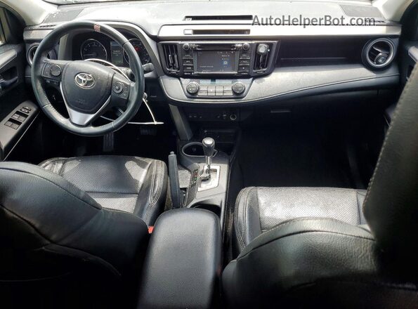 2T3RFREV8GW509323 2016 TOYOTA RAV4 Silver Widok deski rozdzielczej
