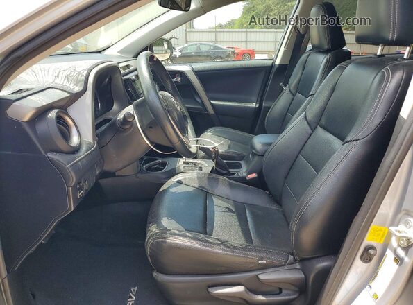 2T3RFREV8GW509323 2016 TOYOTA RAV4 Silver Widok wnętrza z przodu