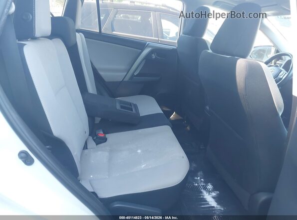 2T3RFREV9JW848454 2018 TOYOTA LE White Vista de la etiqueta del VIN