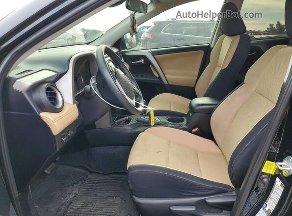 2T3RFREVXJW757385 2018 TOYOTA RAV4 Black წინა სალონის ხედი