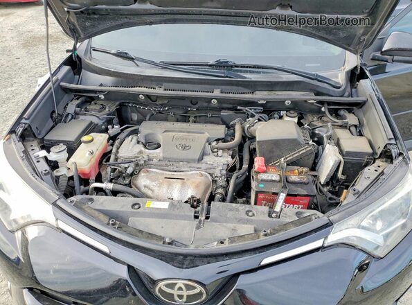 2T3RFREVXJW757385 2018 TOYOTA RAV4 Black ძრავის განყოფილების ხედი