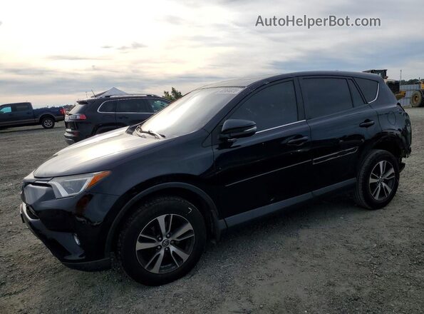 2T3RFREVXJW757385 2018 TOYOTA RAV4 Black წინა მარცხენა ხედი სამი მეოთხედიდან