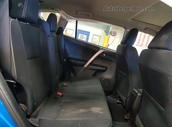 2T3RFREVXJW796946 2018 TOYOTA RAV4 Blue Vista interior trasera