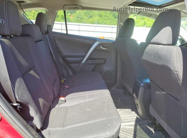 2T3RFREVXJW839472 2018 TOYOTA RAV4 Темно-бордовый Вид задней части салона