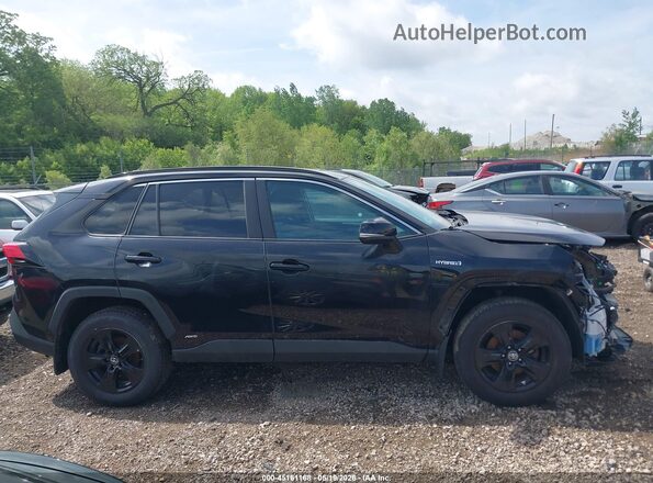 2T3RWRFV1KW013495 2019 TOYOTA RAV4 HYBRID Black Вид задньої частини салону