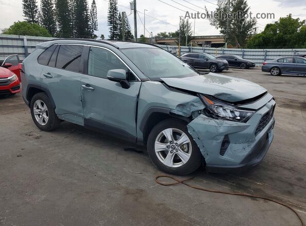 2T3W1RFV8KC015716 2019 TOYOTA RAV4 Серый Передняя правая четверть