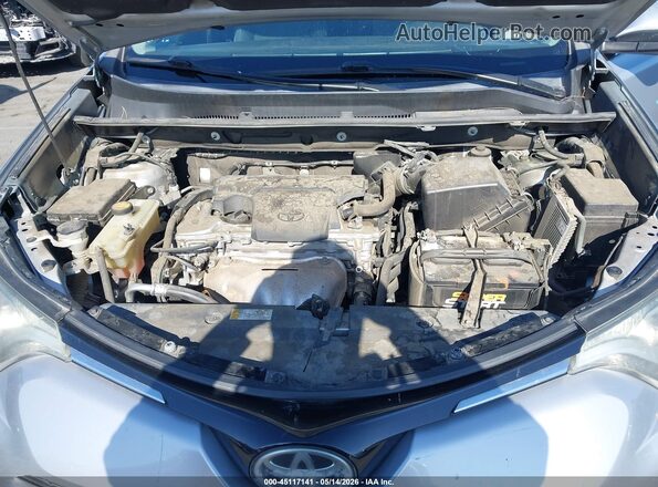 2T3WFREV1HW335096 2017 TOYOTA RAV4 Silver Vista trasera