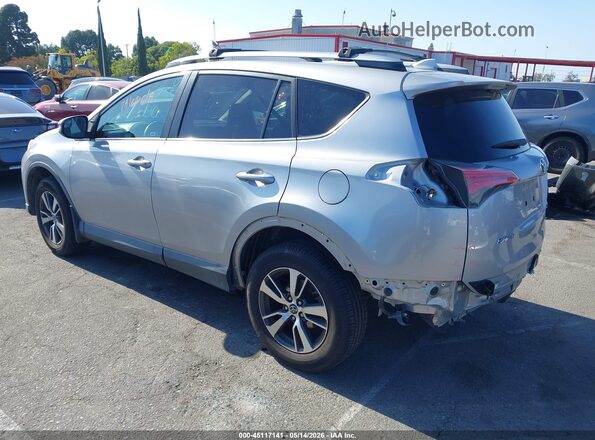 2T3WFREV1HW335096 2017 TOYOTA RAV4 Silver Trasero izquierdo