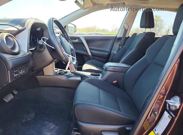 2T3WFREV1JW415908 2018 TOYOTA RAV4 Burgundy Widok wnętrza z przodu