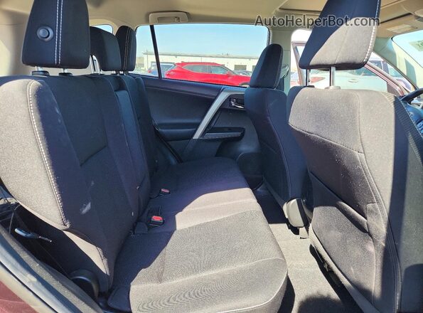 2T3WFREV1JW415908 2018 TOYOTA RAV4 Burgundy Widok wnętrza z tyłu