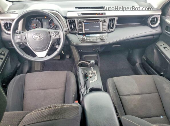 2T3WFREV4HW321371 2017 TOYOTA RAV4 Black Dashboard view