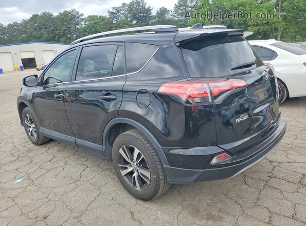 2T3WFREV4HW321371 2017 TOYOTA RAV4 Black Rear left