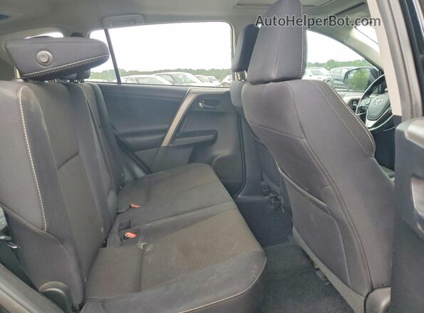 2T3WFREV4HW321371 2017 TOYOTA RAV4 Black Rear seats view