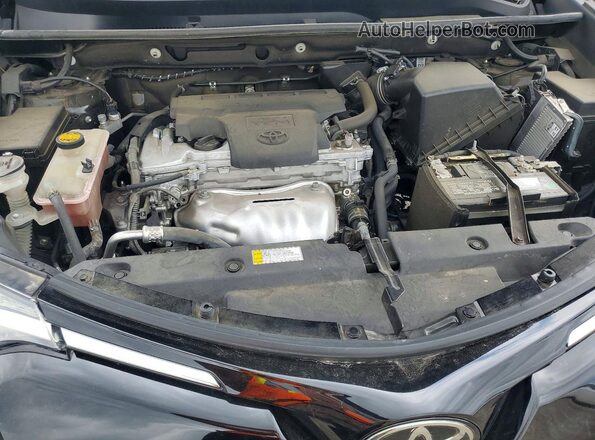 2T3WFREV4HW321371 2017 TOYOTA RAV4 Black Rear interior view