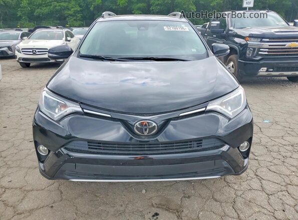 2T3WFREV4HW321371 2017 TOYOTA RAV4 Black Front view