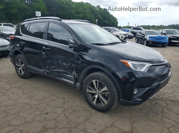 2T3WFREV4HW321371 2017 TOYOTA RAV4 Black Front right