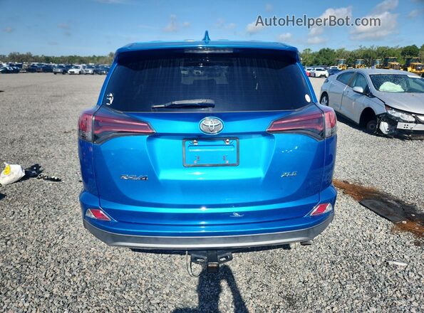 2T3WFREV6JW484433 2018 TOYOTA RAV4 Blue Вид ззаду